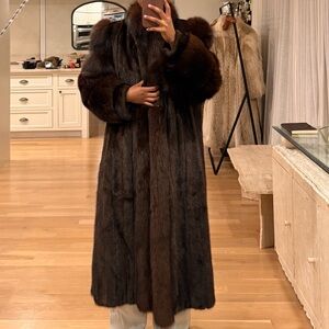 Mink
Full length dark brown mink with fox trim and hands
